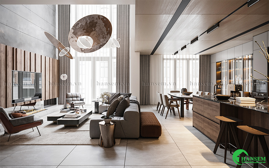 Điểm nhấn thảm màu tối và kết hợp vải nỉ, gỗ công nghiệp sang trọng mang lại cảm giác ấm áp mộc mạc