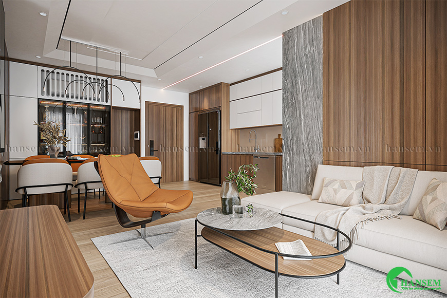 Không gian chung cư hạn chế nên giải pháp thiết kế phòng khách và bếp liền kề tạo sự rộng rãi