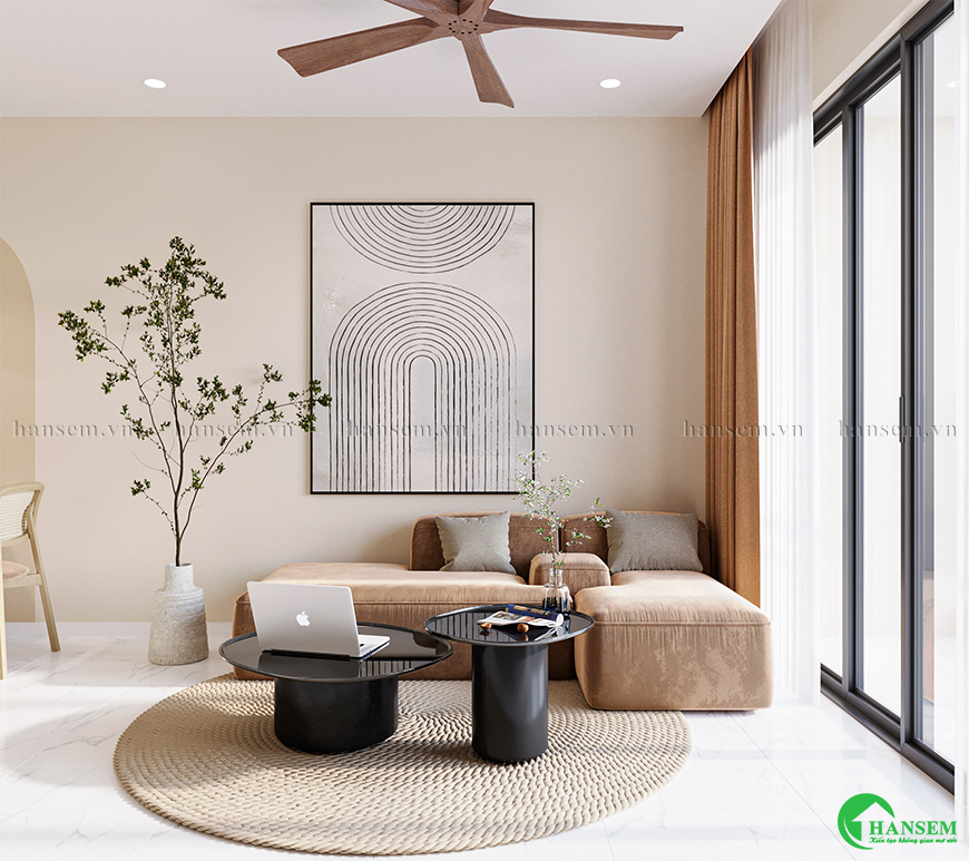 Trang trí bức tranh nghệ thuật và chậu cây xanh điểm nhấn ấn tượng độc đáo cho căn phòng