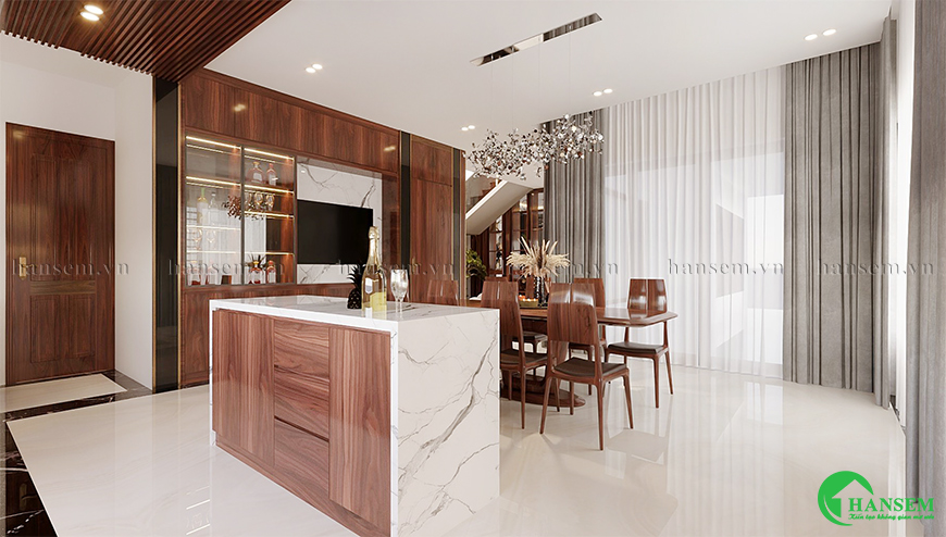 Những ánh đèn trần lung linh kết hợp đảo bếp xinh xắn và ghế bàn ăn hiện đại trở thành nơi gắn bó của chị em nội trợ trong bếp núc